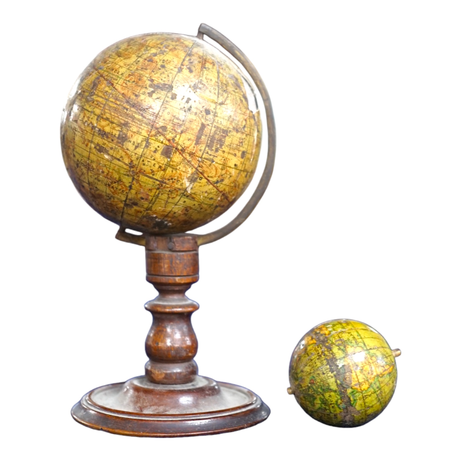 A 19th century 3 inch Stanford celestial globe, the makers panel reads; ‘A new celestial globe showing the principal stars of each Constellation E. Stanford Charing Cross, London’, diameter 7cm, on a turned mahogany stan